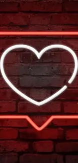 Neon heart on a brick wall glowing red.