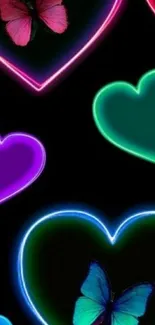 Neon hearts and butterflies in vibrant colors on black background.