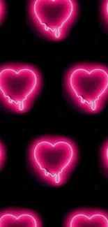 Neon pink heart drip wallpaper with dark background.