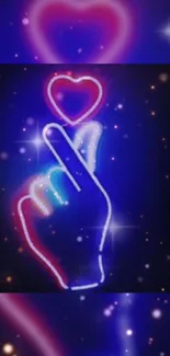 Neon hand with heart gesture on dark blue background.