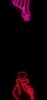 Neon pink hand gestures with hearts on black background.