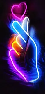 Vibrant neon hand with heart shape glowing in blue and pink hues.