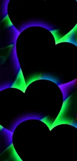 Neon hearts glowing on a black background with colorful accents.