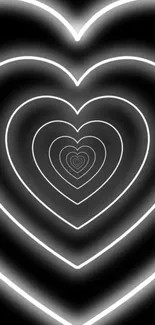 Neon hearts glowing on a black background, creating a stylish pattern.