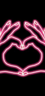 Neon pink heart-shaped hands on black background.