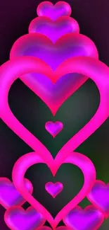 Vibrant neon hearts on dark mobile wallpaper with glowing pink design.