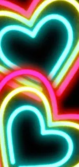 Vibrant neon heart wallpaper with glowing colors.