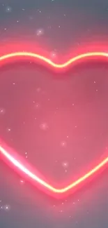 Neon pink heart glowing on dark background.