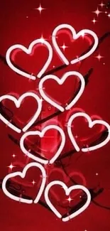 Red neon heart shapes on a vibrant background.