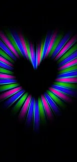 Vibrant neon heart burst on black background for mobile wallpaper.