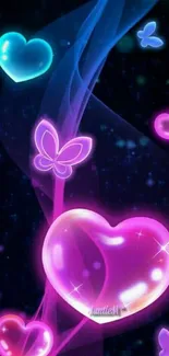 Neon hearts and butterflies glowing in vibrant colors on a dark background.