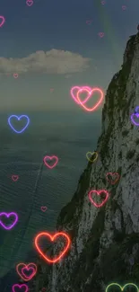 Colorful neon hearts with ocean cliff view.