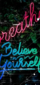 Neon text saying 'Breathe, Believe in Yourself' on a leafy background.