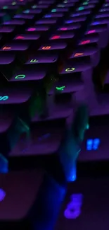 Vibrant neon keyboard with glowing keys in dark lighting.