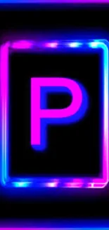 Neon letter P with glowing pink and blue lights on black background.