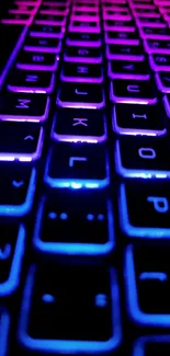 Neon glowing keyboard with vibrant blue light.