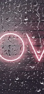 Neon love letters with raindrops on dark gray background.