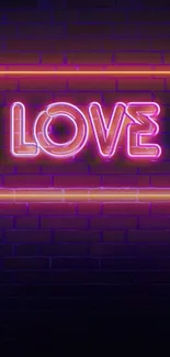 Neon 'Love' sign glowing against a brick wall in purple and pink hues.