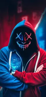 Hooded figure with neon mask in red and blue hues.