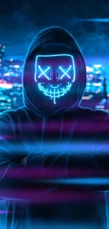 Hooded figure with neon mask in city background wallpaper.