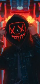 A neon-masked figure stands in vibrant urban lighting.