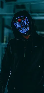 Mysterious figure with neon mask in dark urban setting.