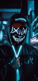 Mysterious figure in a neon mask glows in an urban blue-lit scene.