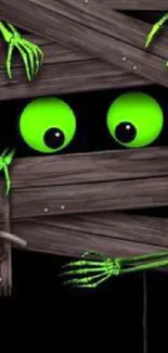 Neon green monster eyes peeking through wooden boards on a black background.