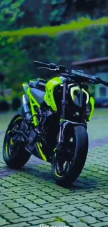 Neon-accented motorcycle on cobblestone.