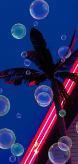 Neon palm silhouette against deep blue sky.