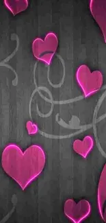 Neon pink hearts on a dark background wallpaper.