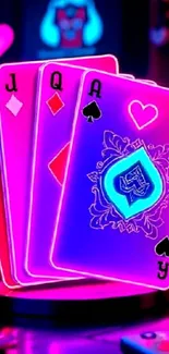 Neon playing cards with vibrant glow and electric colors.