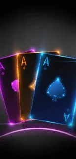 Neon playing cards with glowing aces on a black background.