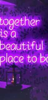 Neon sign with the quote 'together is a beautiful place to be' in purple glow.