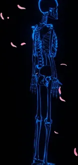 Neon skeleton with pink blossoms on dark background.