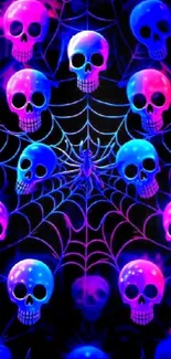 Neon skulls and spider web design wallpaper, vibrant hues of pink and blue.