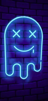 Neon blue ghost design on a dark brick wall.