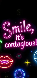 Neon sign with 'Smile, it's contagious!' text.