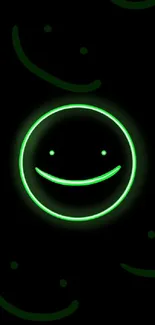 Neon green smiley face on a dark backdrop wallpaper.