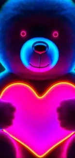 Neon teddy bear holding a glowing heart.