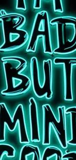 Neon text reading 'I'm bad but mind good'.