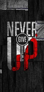 Inspirational wallpaper with 'Never Give Up' in striking black, red, and white.