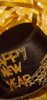 Gold themed New Year wallpaper with champagne and hat.