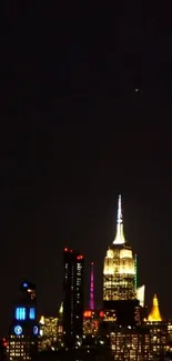 New York skyline illuminated at night with vibrant city lights.