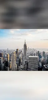 New York City skyline with skyscrapers and blue sky.