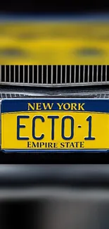 New York ECTO-1 license plate wallpaper in bold yellow and blue.