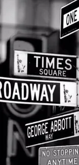 Black and white NYC street signs wallpaper featuring Times Square and Broadway.