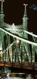 Night bridge with UFO hovering in the sky.