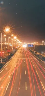 Long exposure of city night street with vibrant light streaks and street lamps.