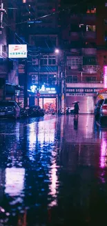 Rainy city street with neon lights reflecting on wet pavement at night.